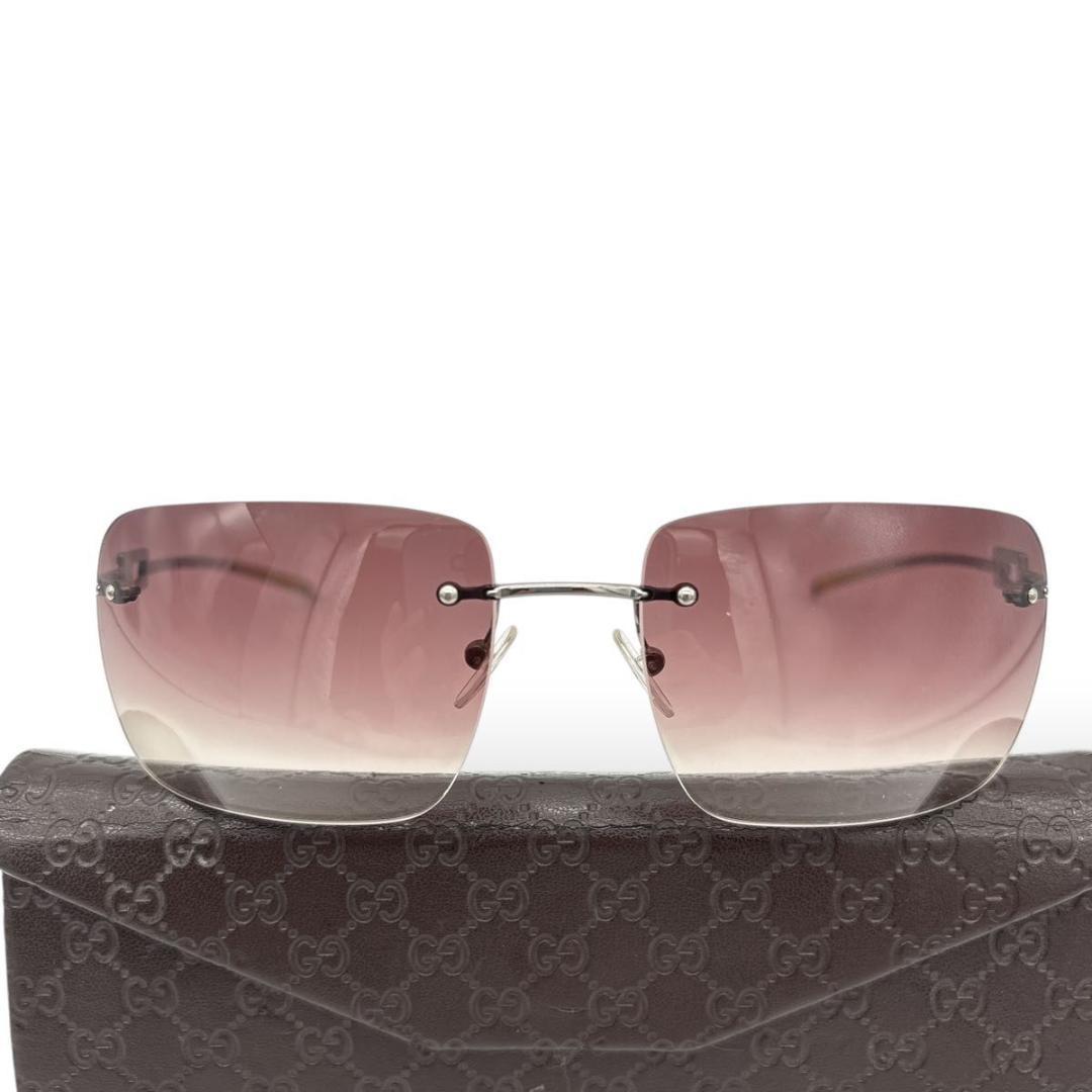 小物 GUCCI sunglasses rimless stone silver