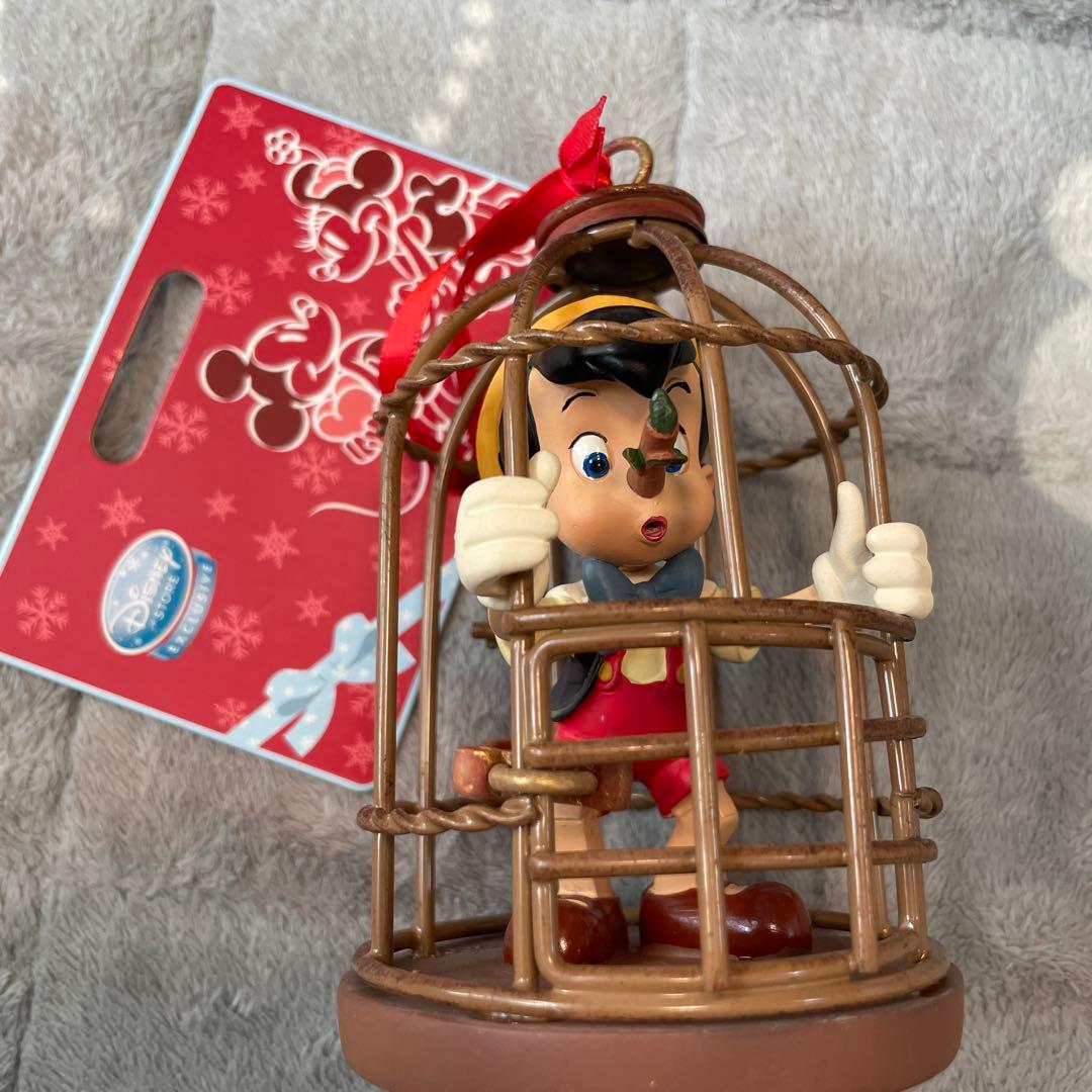 ディズニー　オーナメント　フィギュア　ピノキオ　ストロンボリ劇場　鳥かご　南京錠