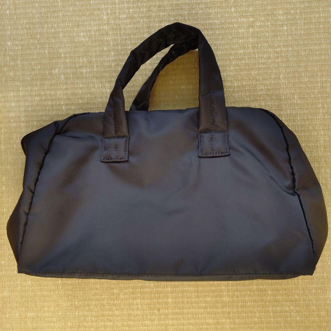 コムデギャルソン　黒のナイロンバッグ