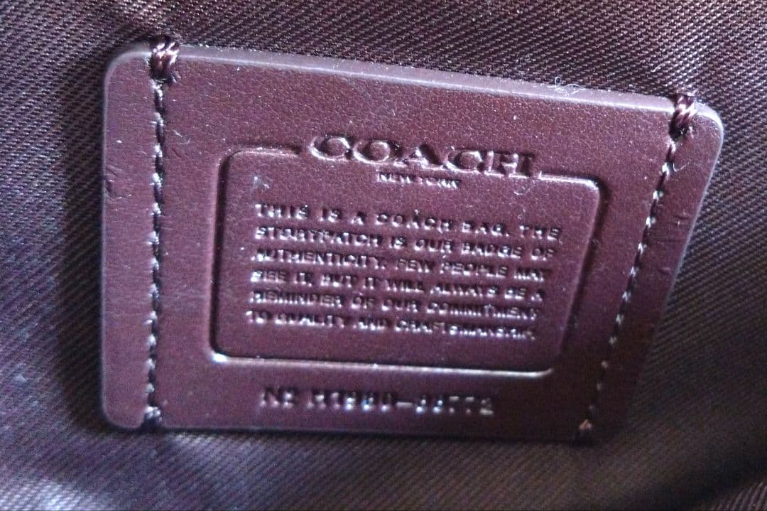 COACH恐竜柄革ウエストポーチ