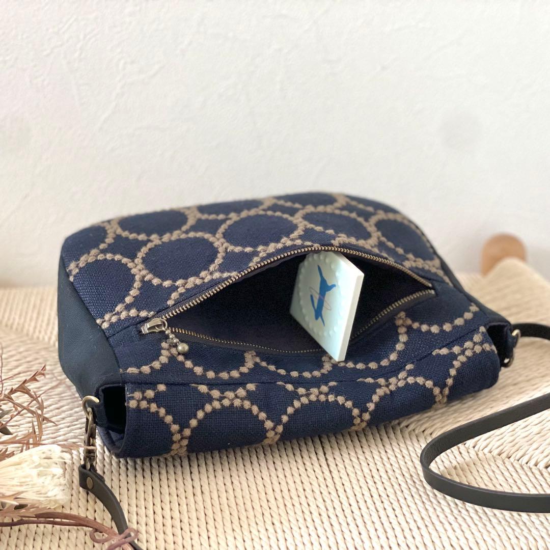 ⚮̈ミナペルホネン　tambourine いっぱいポッケのフラップポシェット