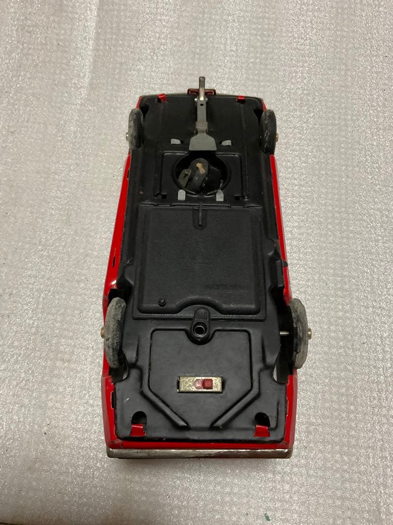 TAIYO／MUTANG・mach1。赤／黒ツートン。【電池を入れても無作動】。