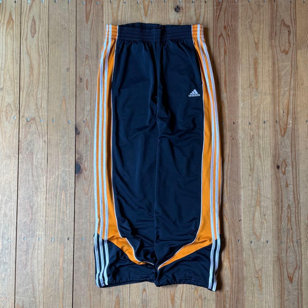 adidas ストライプジャージパンツ ブラック/オレンジ