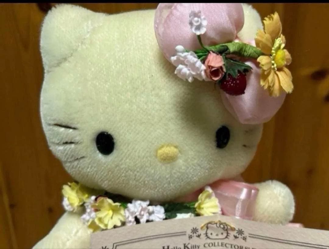 ハローキティ ぬいぐるみ 花飾り付き　保証書付