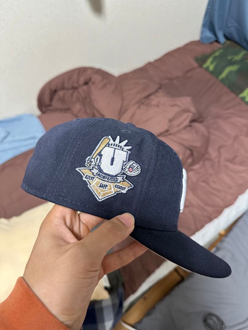 応援グッズ New era x Undefeated Cap 7 3/8