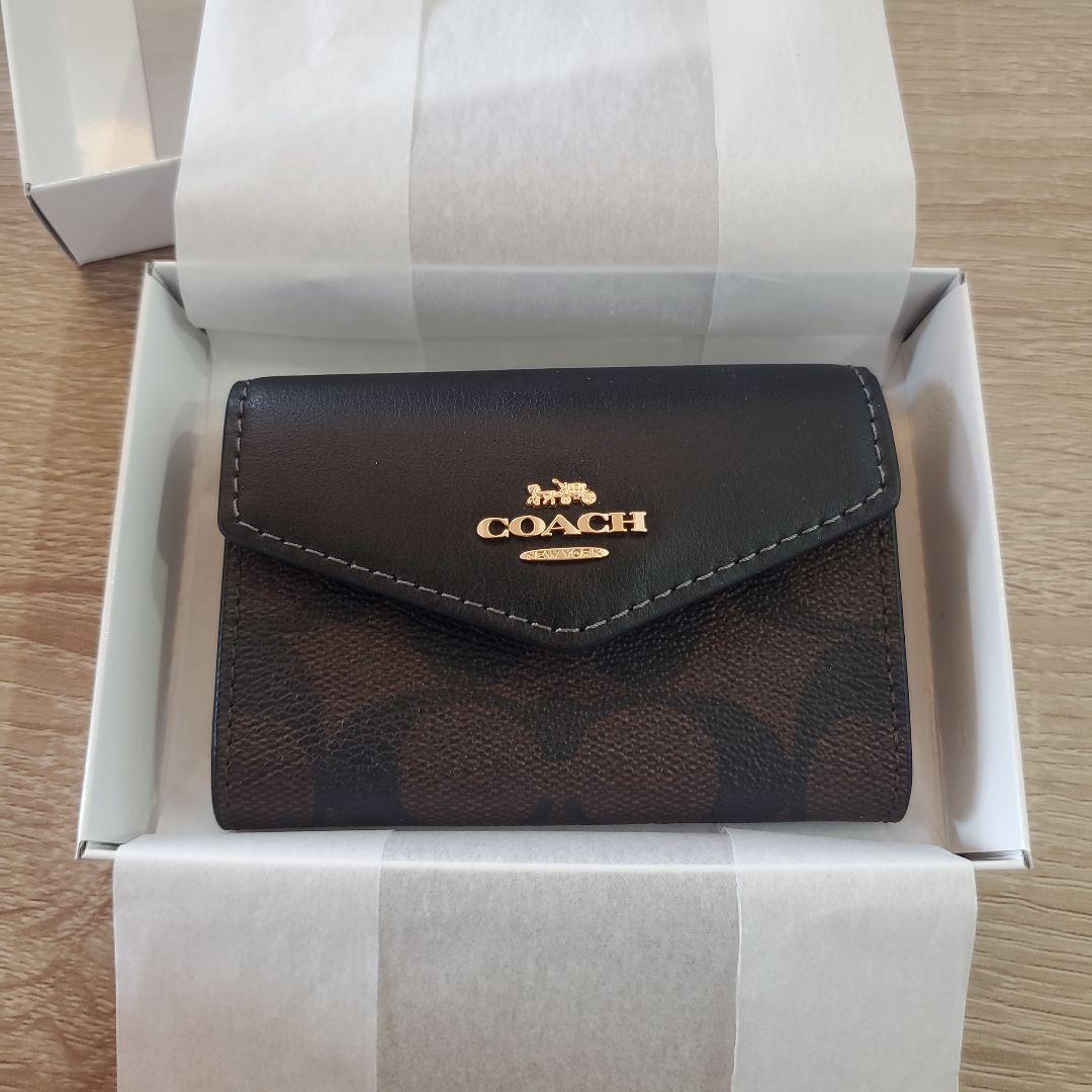 コーチ フラップ カード ケース 名刺入れ 黒 ブラウン シグネチャー 新品