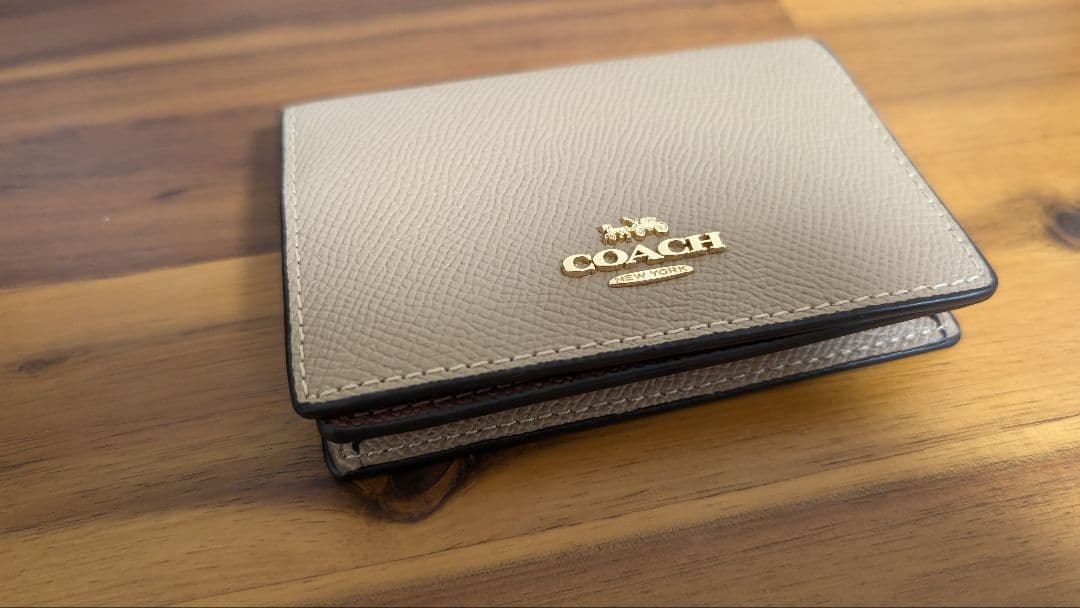 COACH ベージュ 二つ折り 名刺入れ