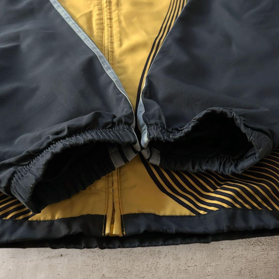 希少adidasアディダスARIS FCナイロンジャケットドローコード刺繍ロゴ