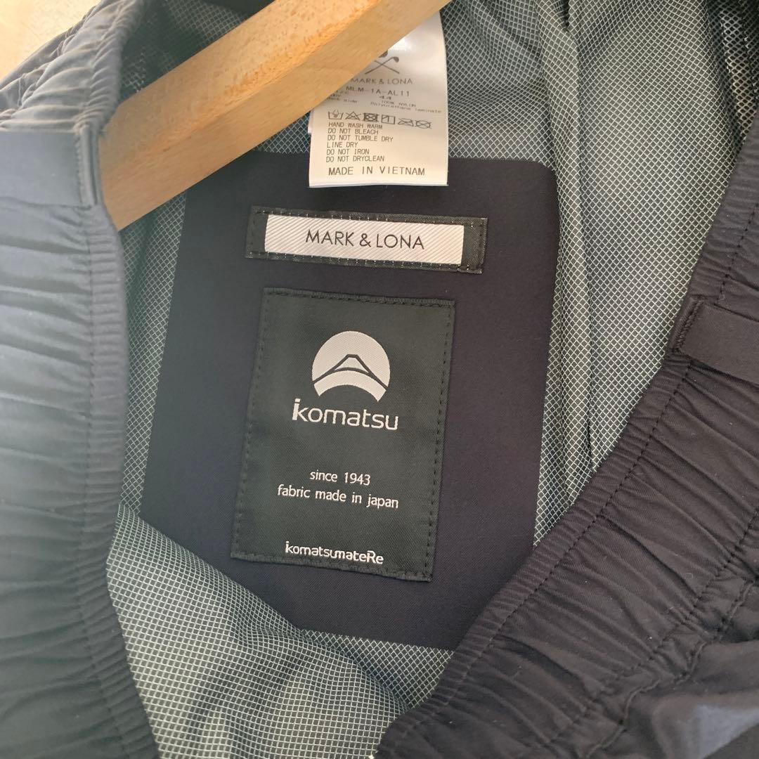 マークアンドロナ　komatsu レインウェア ブラック/レッド