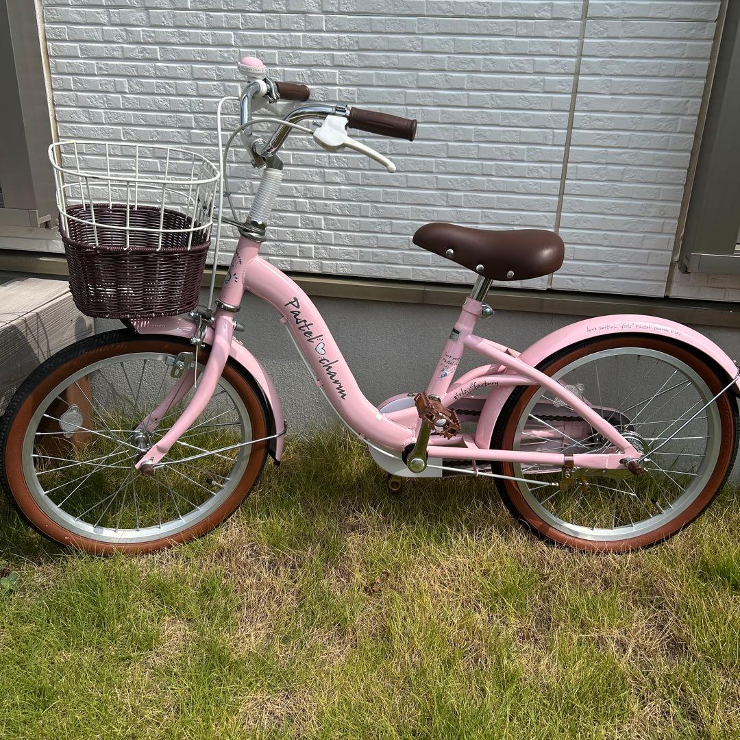 子供用自転車 ピンク 前カゴ付き　補助輪あり