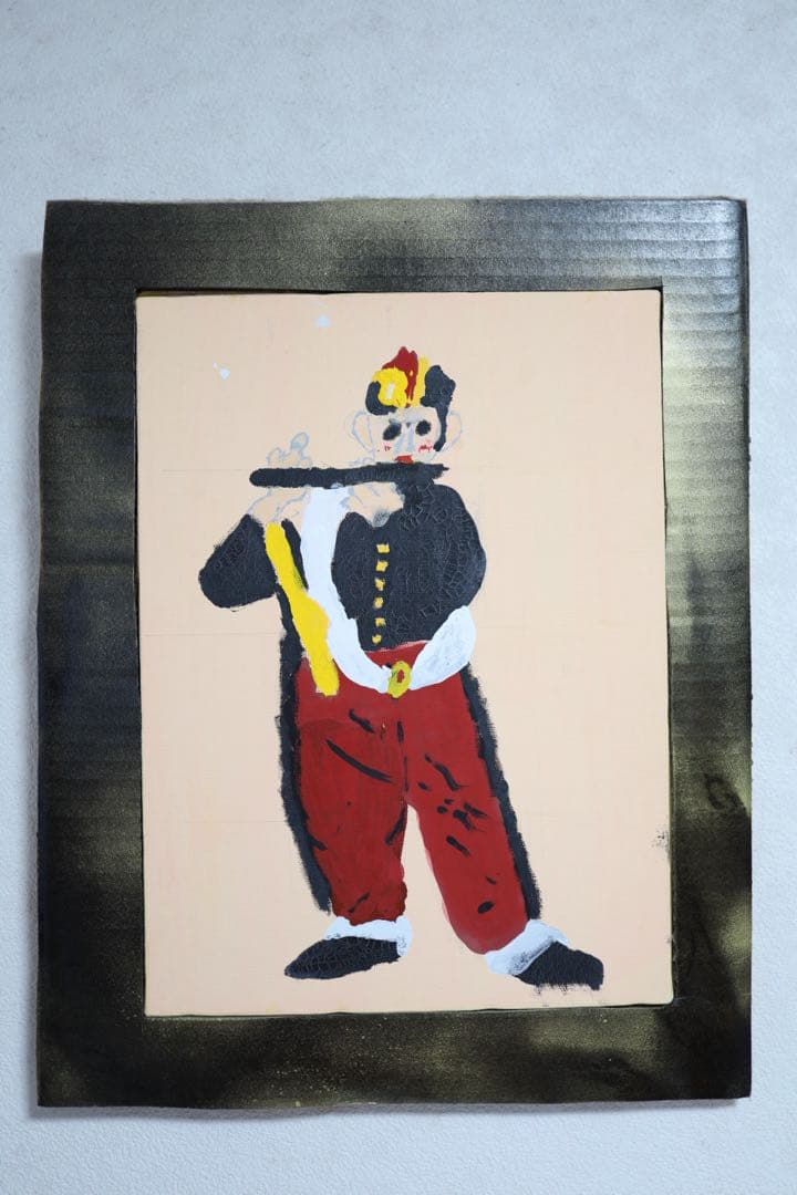 小学生が描いた「笛を吹く少年」