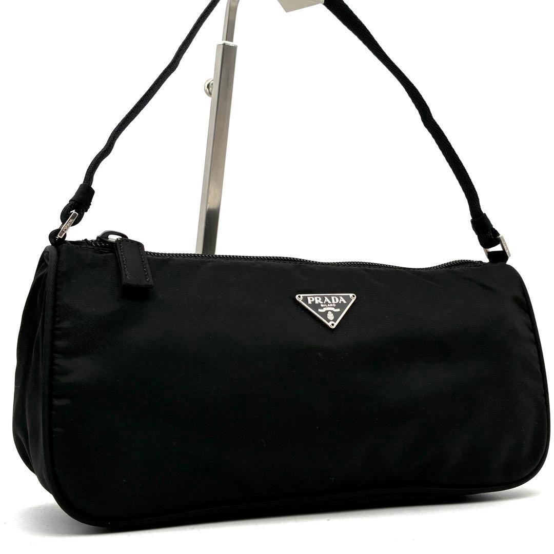 未使用保管品 プラダ アクセサリーポーチ 三角ロゴ 白タグ ハンドバッグ 黒