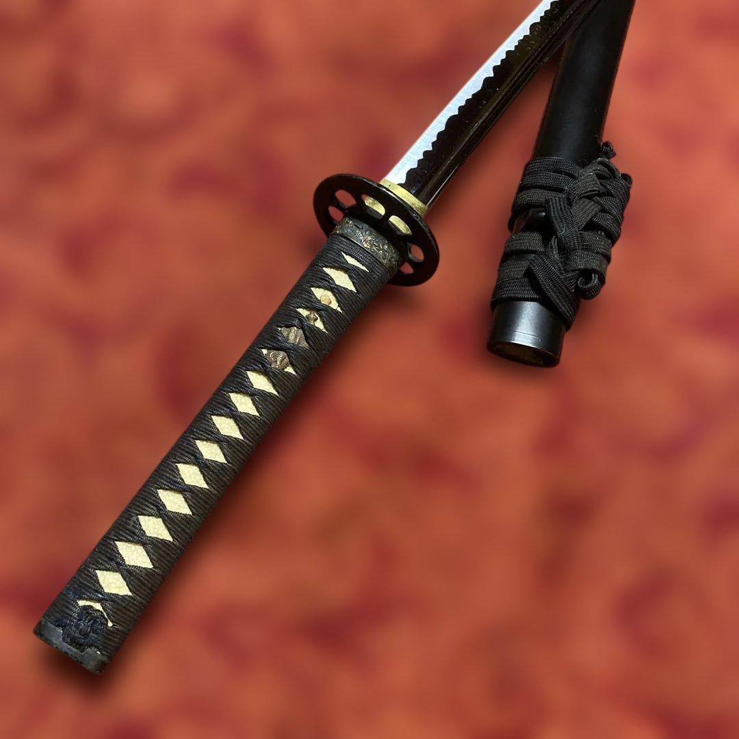 高級居合刀 黒柄 蓮根輪切透し丸鍔 黒呂鞘