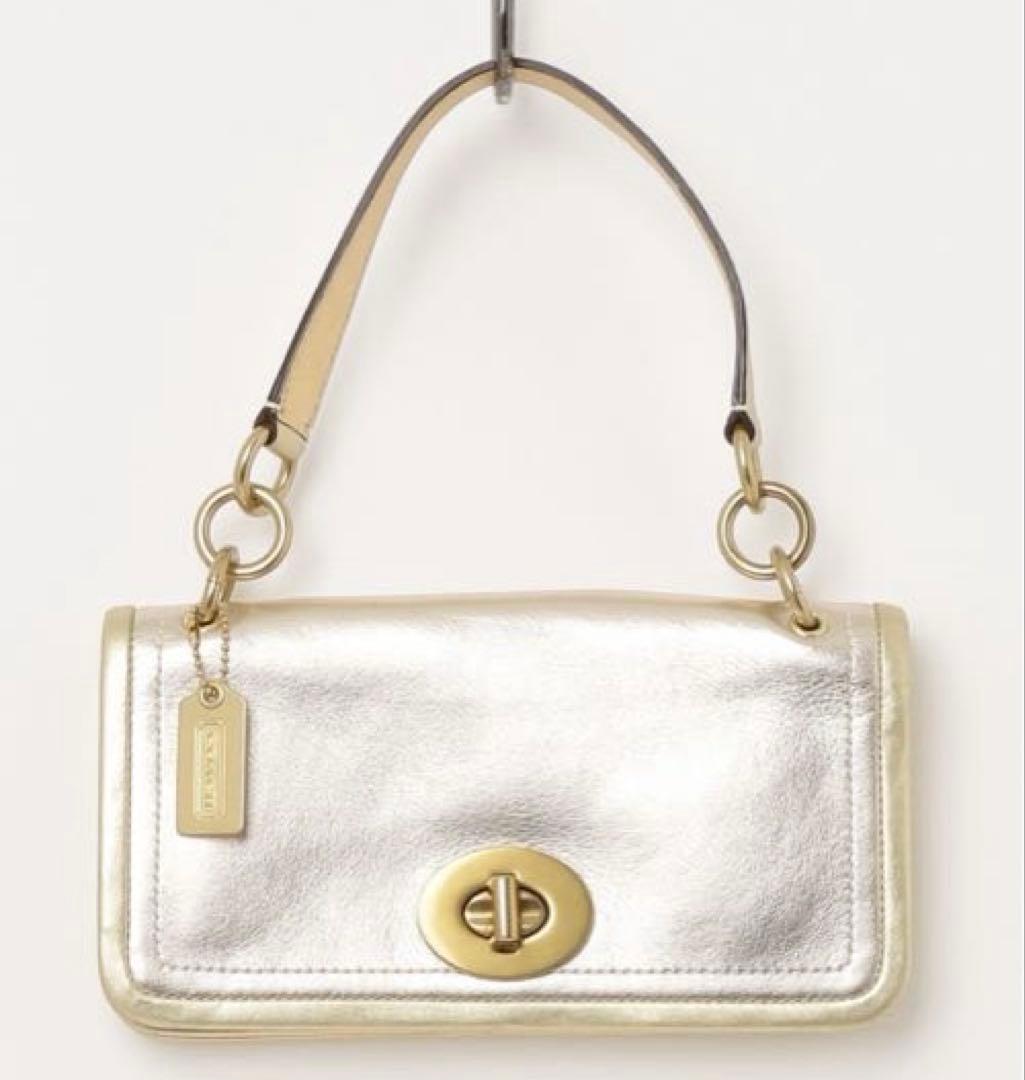 バッグ Coach legacy stripe turn lock llic