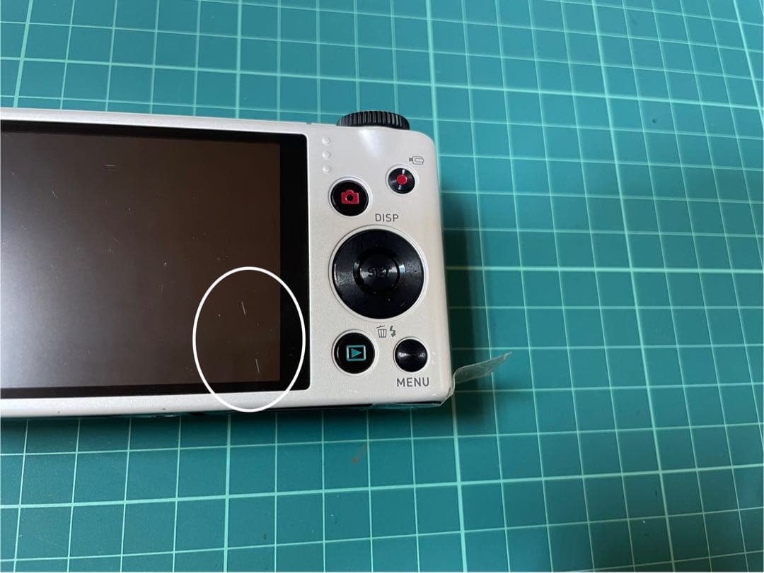 CASIO EXILIM EX-ZR100 ホワイト [電池挿入ふたロック不良]